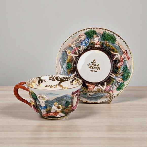 Vintage Capodimonte Italian Relief Scene Cup and Saucer: Artistic Decor